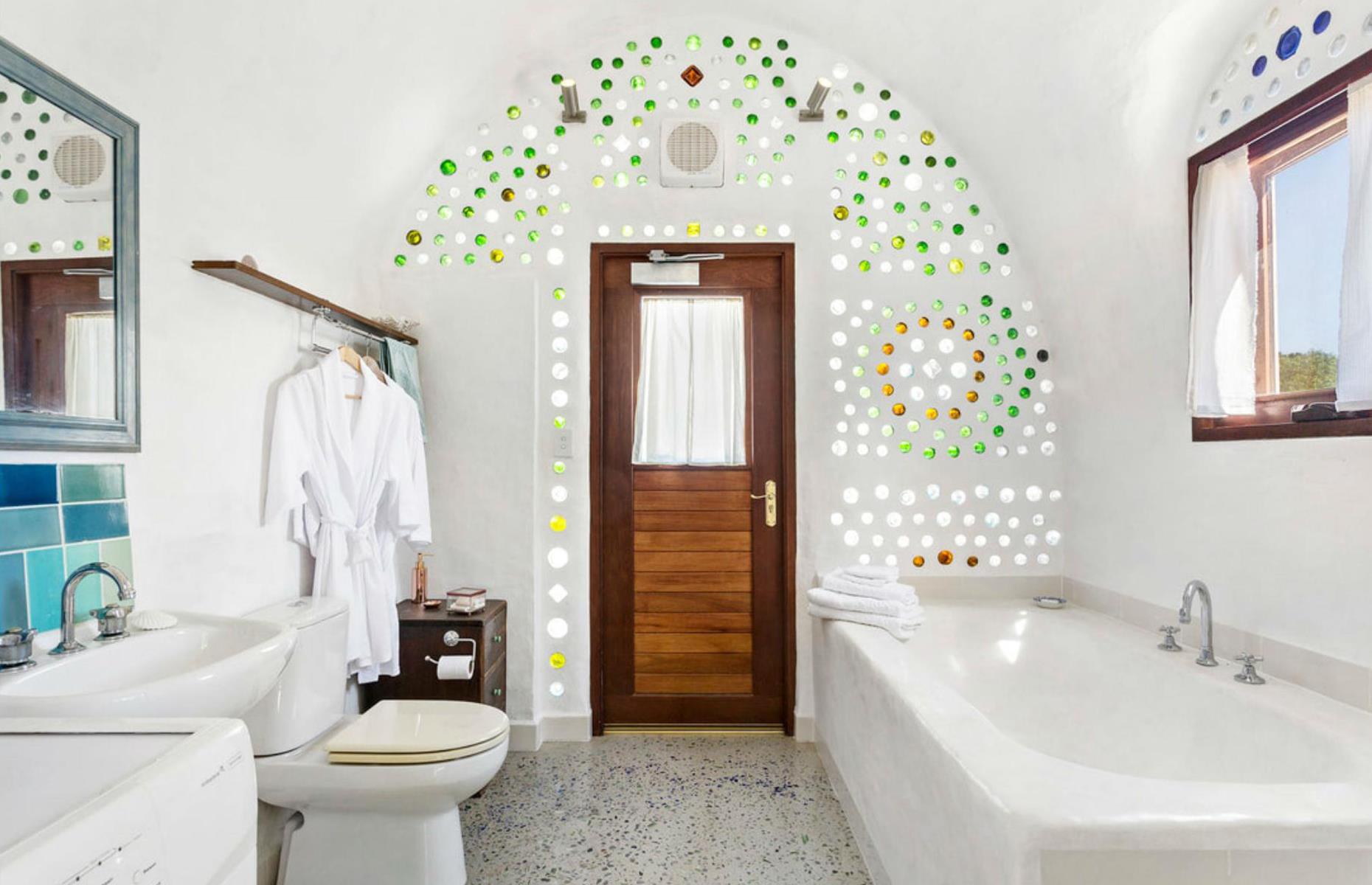 Earthship Ironbank, Adelaide, Australia:  9 eco home building materials that are better than concrete